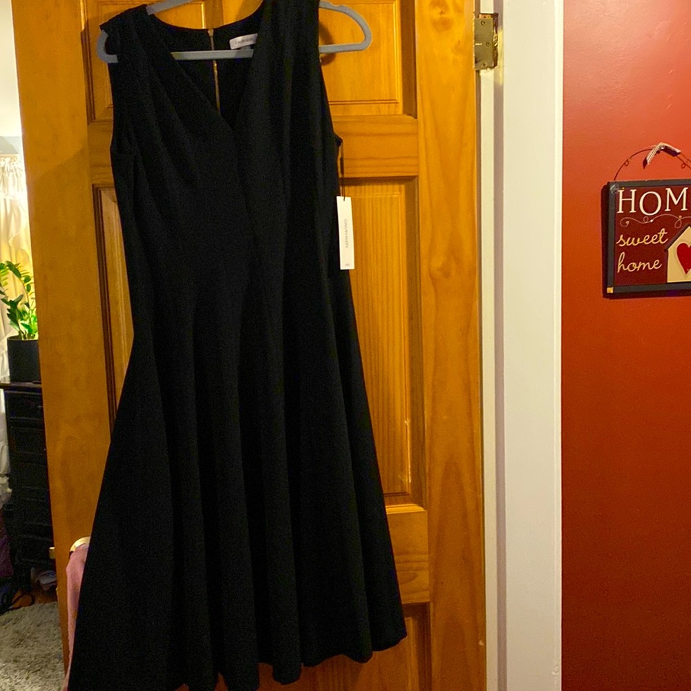 Size 12 black sleeveless new Calvin Klein dress.